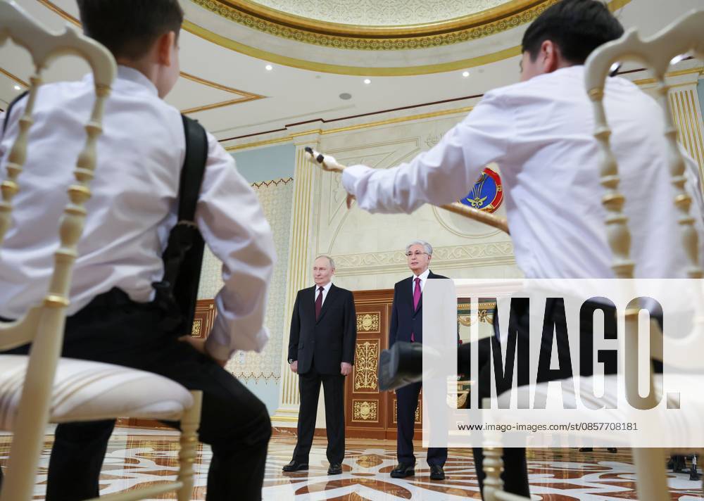 Kazakhstan Russia 9174662 27.05.2026 Russian President Vladimir Putin and Kazakh President Kassym-Jomart Tokayev attend a welcome ceremony upon Putin s arrival at Nursultan Nazarbayev International Airport in Astana, Kazakhstan. Alexander Kazakov Sputnik Astana Kazakhstan