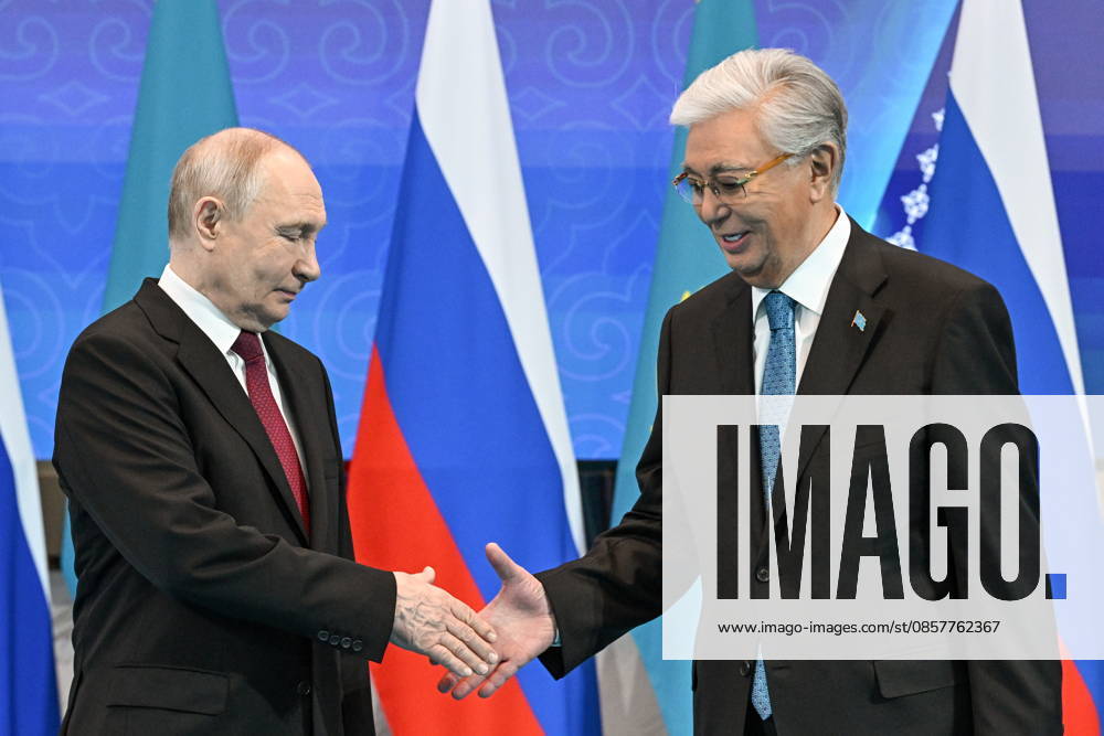 KAZAKHSTAN, ASTANA - MAY 28, 2026: Russia s President Vladimir Putin (L) and Kazakhstan s President Kassym-Jomart Tokayev shake hands during a meeting at the Independence Palace. Sergei Bobylev TASS 93124942