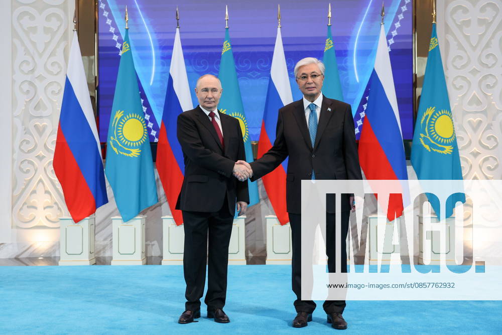 KAZAKHSTAN, ASTANA - MAY 28, 2026: Russia s President Vladimir Putin (L) and Kazakhstan s President Kassym-Jomart Tokayev shake hands during a meeting at the Independence Palace. Alexander Kazakov Russian Presidential Press and Information Office TASS 93125141