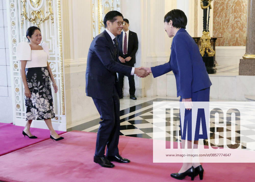 Japan-Philippines summit Japanese Prime Minister Sanae Takaichi (R) greets Philippine President Ferdinand Marcos Jr. and his wife Louise Araneta-Marcos at the State Guest House in Tokyo on May 28, 2026. (Pool photo) A14AA0005617052P