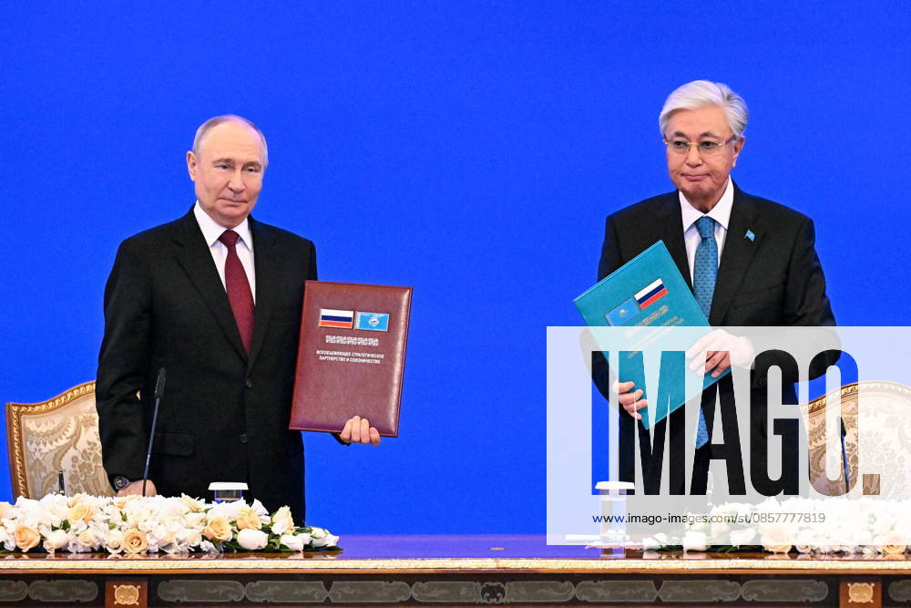 KAZAKHSTAN, ASTANA - MAY 28, 2026: Russia s President Vladimir Putin (L) and Kazakhstan s President Kassym-Jomart Tokayev pose during a ceremony to sign joint documents at the Independence Palace. Sergei Bobylev TASS 93130822