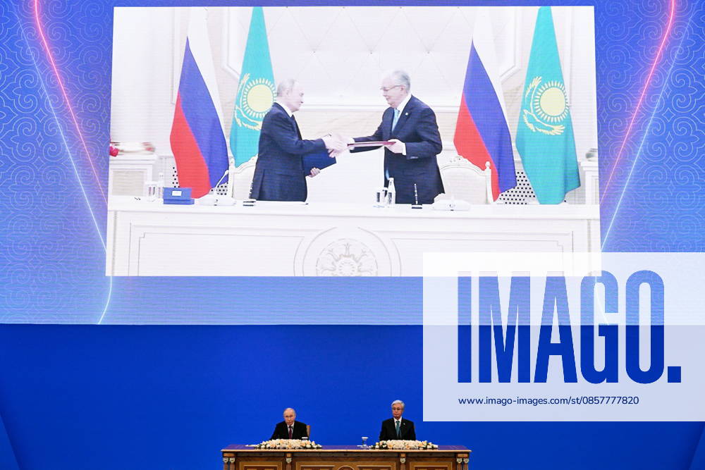 KAZAKHSTAN, ASTANA - MAY 28, 2026: Russia s President Vladimir Putin (L) and Kazakhstan s President Kassym-Jomart Tokayev are seen during a ceremony to sign joint documents at the Independence Palace. Sergei Bobylev TASS 93130833