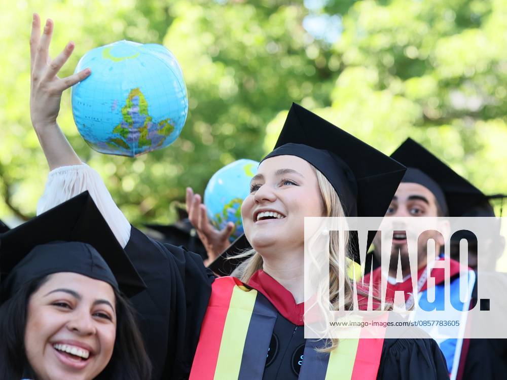 Crown Princess Elisabeth (C) and her fellow graduates celebrate with inflatable globes, at a Harvard university-wide celebration at Harvard Yard, part of the Class of 2026 graduation days in Harvard University, in Cambridge, USA, Thursday 28 May 2026. BENOITxDOPPAGNE 175270567