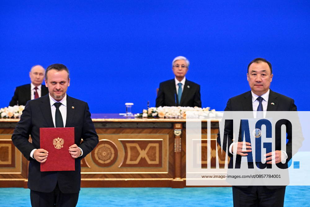 KAZAKHSTAN, ASTANA - MAY 28, 2026: Russia s Transport Minister Andrei Nikitin and Kazakhstan s Transport Minister Narlan Sauranbayev (L-R front) pose during a ceremony to sign joint documents at the Independence Palace. Sergei Bobylev TASS 93131622