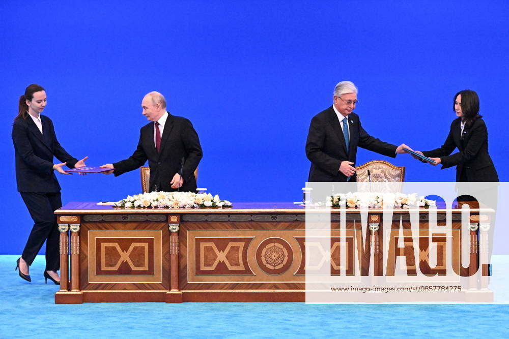KAZAKHSTAN, ASTANA - MAY 28, 2026: Russia s President Vladimir Putin (2nd L) and Kazakhstan s President Kassym-Jomart Tokayev (2nd R) are seen during a ceremony to sign joint documents at the Independence Palace. Sergei Bobylev TASS 93132307