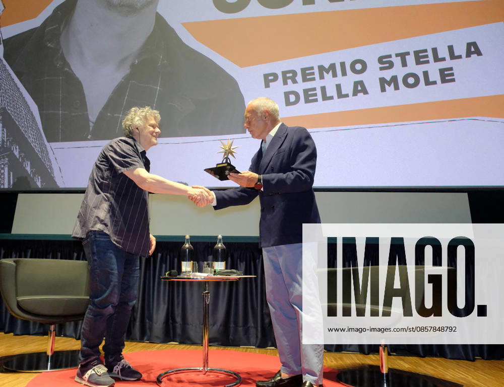 Michel Gondry At Stella Della Mole Award Ceremony - Turin French director Michel Gondry receives the Stella della Mole award in recognition of his contribution to filmmaking during a ceremony at Cinema Massimo in Turin, Italy, on May 28, 2026 alongside National Cinema Museum director Carlo Chatrian, as he reviews his eclectic career and introduces the screening of Microbo&Gasolina. Photo by Costantino Sergi IPA ABACAPRESS.COM Torino Torino