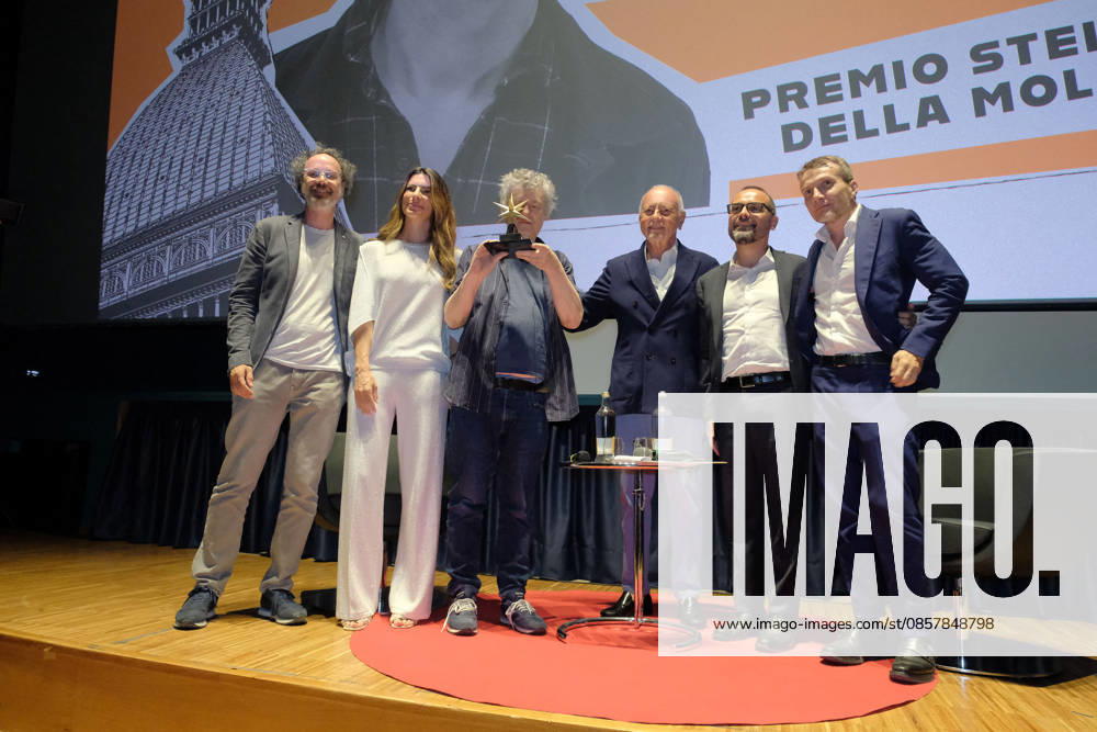 Michel Gondry At Stella Della Mole Award Ceremony - Turin French director Michel Gondry receives the Stella della Mole award in recognition of his contribution to filmmaking during a ceremony at Cinema Massimo in Turin, Italy, on May 28, 2026 awarded by museum president Enzo Ghigo, alongside National Cinema Museum director Carlo Chatrian, as he reviews his eclectic career and introduces the screening of Microbo&Gasolina. Photo by Costantino Sergi IPA ABACAPRESS.COM Torino Torino