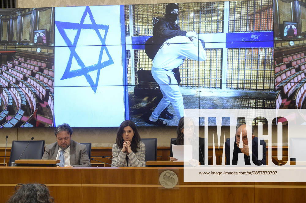 IPA85160297 - Rome Senate presentation of UN special rapporteur s report on the occupied Palestinian territories, pictured Dario Carotenuto Laura Boldrini Francesca Albanese Peppe De Cristofaro in the background pictures from Gaza