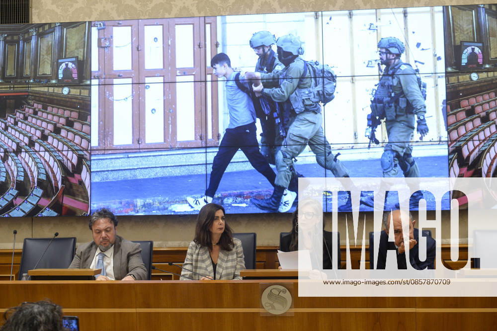 IPA85160305 - Rome Senate presentation of UN special rapporteur s report on the occupied Palestinian territories, pictured Dario Carotenuto Laura Boldrini Francesca Albanese Peppe De Cristofaro in the background pictures from Gaza
