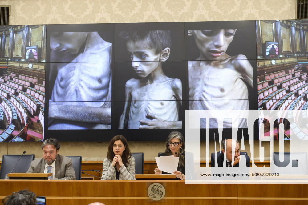 IPA85160315 - Rome Senate presentation of UN special rapporteur s report on the occupied Palestinian territories, pictured Dario Carotenuto Laura Boldrini Francesca Albanese Peppe De Cristofaro in the background images from Gaza