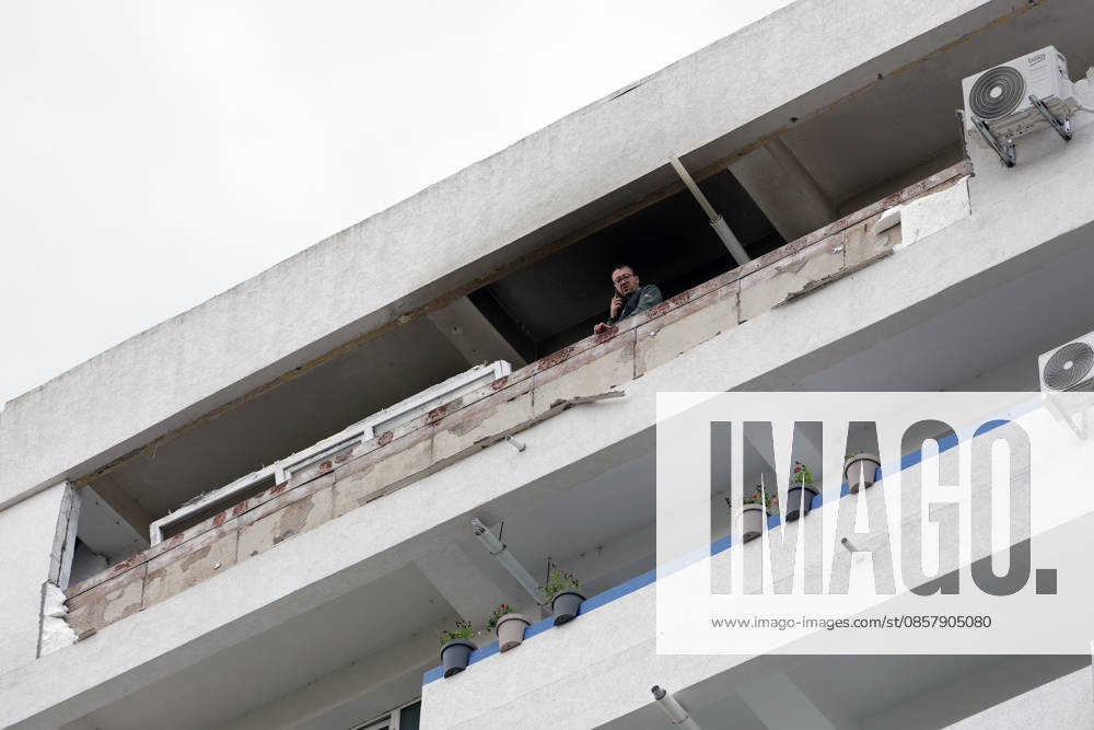 (260529) -- GALATI, May 29, 2026 -- A staff worker checks the residential apartment building damaged by a Russian drone in Galati, Romania, May 29, 2026. At least two people were injured after a drone struck a residential apartment building in Galati, Romania, near the border with Ukraine, local media reported Friday. (Photo by Xinhua) ROMANIA-GALATI-DRONE CristianxCristel