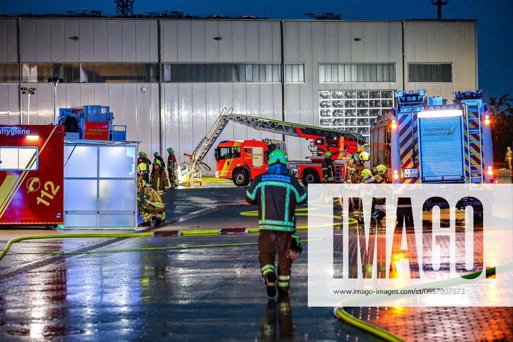 Major fire in a warehouse and logistics hall Hygiene component center, turntable ladder in the background Hanover Anderten Lohweg 7, Niedersachsen industrial estate, Hanover region Germany