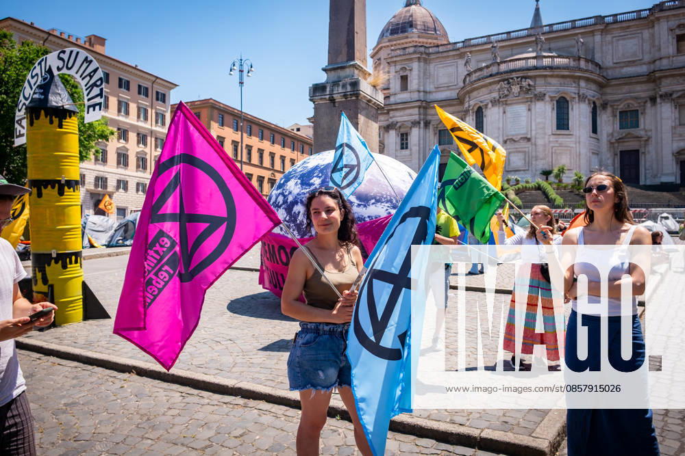 Extinction Rebellion activists are launching a 24-hour rally in Piazza dell Esquilino, just days before the 80th anniversary of the Italian Republic on June 2nd. They say: there is nothing to celebrate as long as rights, justice, and dignity continue to be denied. Oil extraction is imposed through violence and war to produce ever more energy, further increasing inequality. Activists assembled a rocket made of oil drums. It reads: Fascists on Mars. Democracy on earth reads the banner. Rome Italy - ZUMAg256 20260530_znp_g256_018
