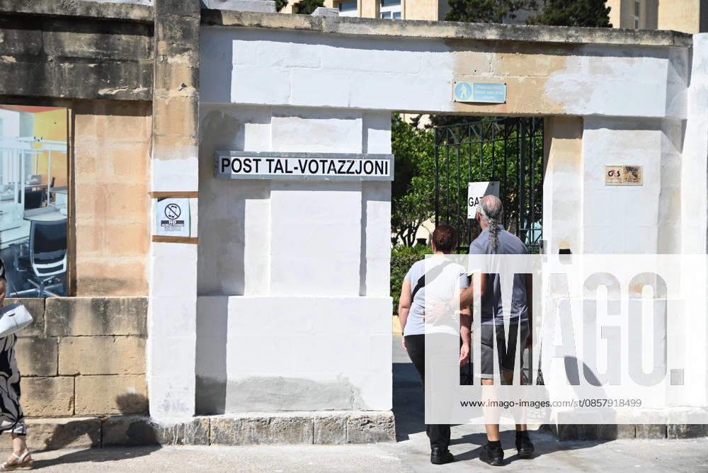 (260530) -- VALLETTA, May 30, 2026 -- People walk into a polling station for the parliamentary election in Zejtun, Malta, May 30, 2026. Malta held a snap parliamentary election on Saturday, with the ruling Labour Party widely expected to secure a fourth consecutive term in office. (Photo by Xinhua) MALTA-PARLIAMENTARY ELECTION-VOTING JonathanxBorg