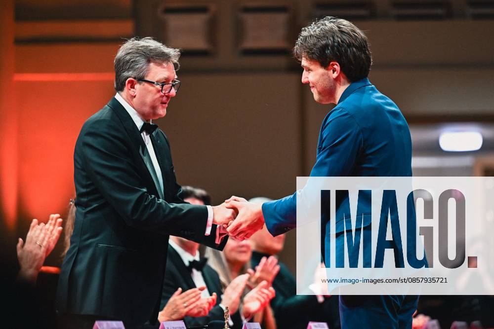 President of the jury Gilles Ledure, the winner and Ettore Pagano of Italy pictured after the final of the 2026 Queen Elisabeth Cello Competition, at the Brussels Bozar concert hall, Saturday 30 May 2026. This year s edition of the competition for career-starting musicians takes place from 4 to 30 May. EMILExWINDAL 175504754