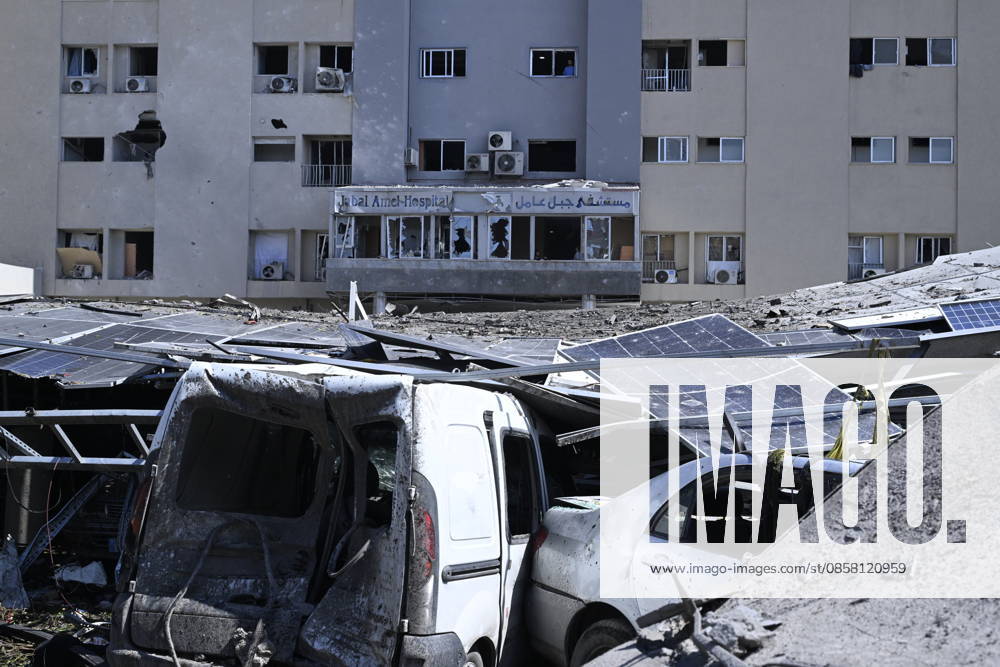 Damage reported near hospital following strike in southern Lebanon TYRE, LEBANON - JUNE 02: Buildings and a parking area opposite Jabal Amel Hospital, the largest hospital in the city of Tyre, sustain heavy damage following a strike in the Maarakah area of southern Lebanon, on June 02, 2026. The hospital building, nearby structures, and vehicles are also damaged. Houssam Shbaro Anadolu Tyre Lebanon. Editorial use only. Please get in touch for any other usage.