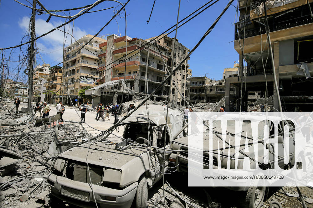 Lebanese women look from a window of partially destroyed Jabal Amel Hospital at demolished buildings that were targeted by Israeli air strikes in the southern Lebanese port city of Tyre. Clashes have continued in southern Lebanon despite Israel and Hezbollah accepting a US plan for a partial ceasefire. President Donald Trump said he had spoken to both sides and they agreed that all shooting will stop , after Iran warned Israeli military actions in Lebanon were a threat to the US-Iran ceasefire. Tyre Lebanon - ZUMAn313 20260602_zip_n313_017