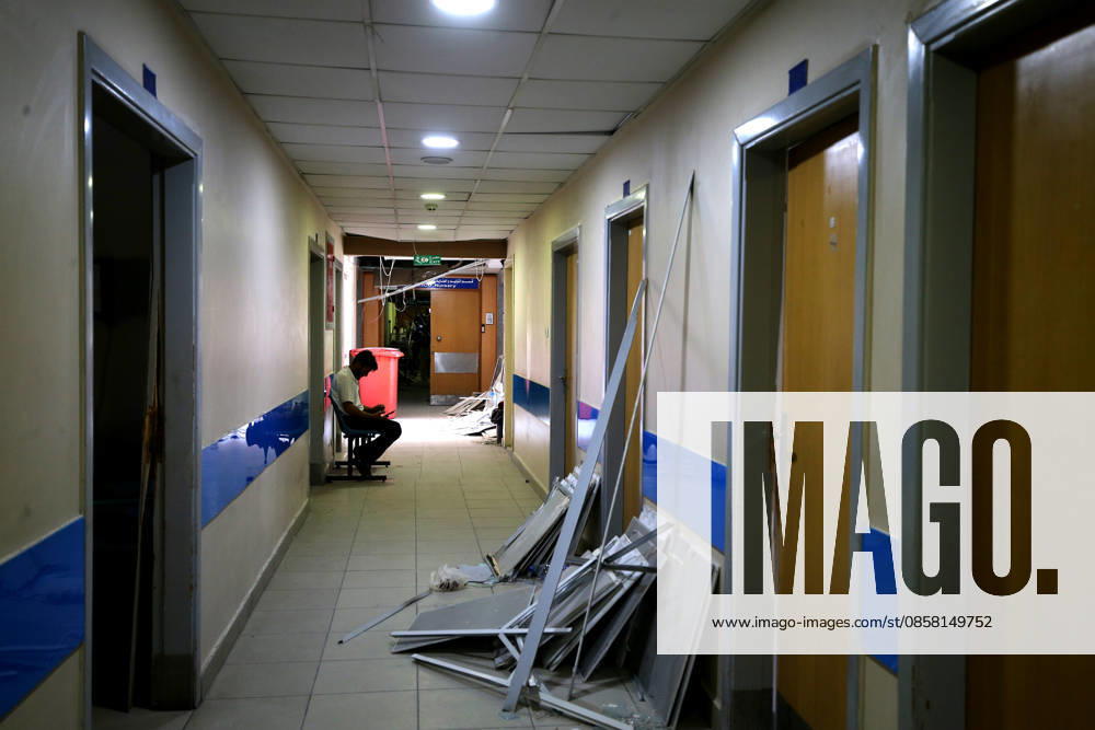 02 June 2026, Lebanon, Tyre: A man sits inside damage hallway at Jabal Amel Hospital that was destroyed in Israeli air strikes in the southern Lebanese port city of Tyre. Clashes have continued in southern Lebanon despite Israel and Hezbollah accepting a US plan for a partial ceasefire. President Donald Trump said on Monday that he had spoken to both sides and they agreed that all shooting will stop , after Iran warned Israeli military actions in Lebanon were a threat to the US-Iran ceasefire. Photo: dpa Beirut Lebanon - ZUMAn313 20260602_zip_n313_015