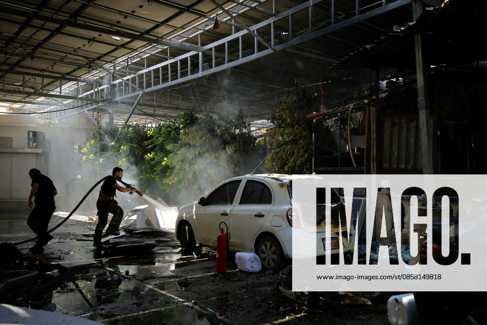 A fire fighter douses fire at a parking lot of Jabal Amel Hospital that was destroyed in Israeli air strikes in the southern Lebanese port city of Tyre. Clashes have continued in southern Lebanon despite Israel and Hezbollah accepting a US plan for a partial ceasefire. President Donald Trump said he had spoken to both sides and they agreed that all shooting will stop , after Iran warned Israeli military actions in Lebanon were a threat to the US-Iran ceasefire. Tyre Lebanon - ZUMAn313 20260602_zip_n313_014