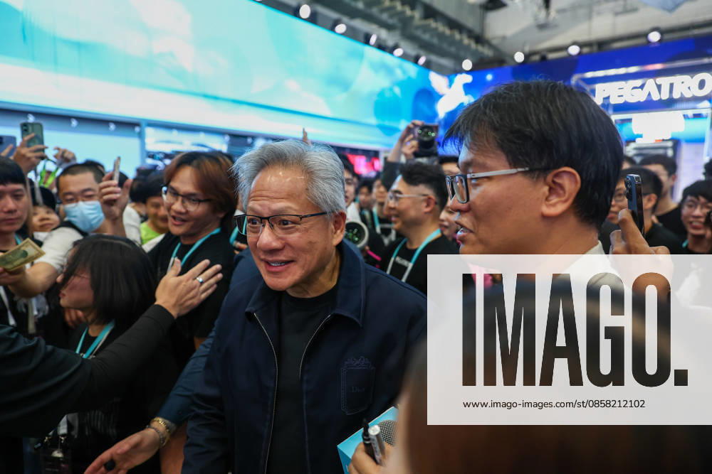NVIDIA s CEO Jensen Huang visits COMPUTEX TAIPEI 2026 TAIPEI, TAIWAN - JUNE 3: Jensen Huang, the CEO of American multinational tech giant NVIDIA, is surrounded by heaps of supporters and staff during his visit to the COMPUTEX TAIPEI trade show, in Taipei, Taiwan, on June 3, 2026. COMPUTEX TAIPEI is one of the world’s largest and most significant trade shows, featuring latest technologies, drones, data centres, Artificial Intelligence (AI) technologies, supercomputers, semiconductors products and other things from major international firms such as Nvidia, Intel, NXP and Foxconn. Daniel Ceng Anadolu Taipei Taiwan. Editorial use only. Please get in touch for any other usage.