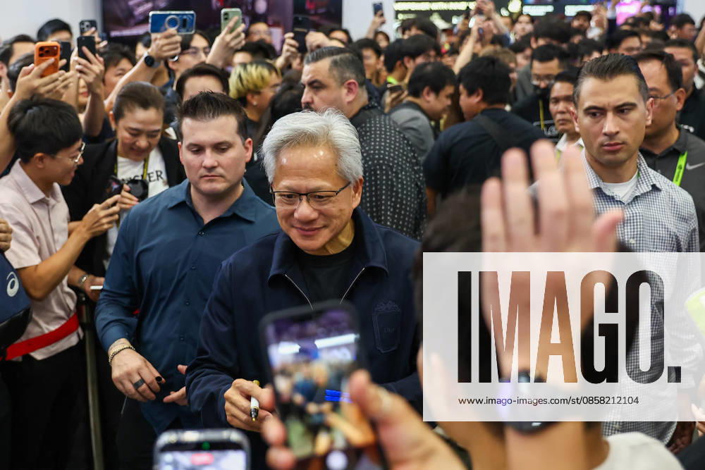 NVIDIA s CEO Jensen Huang visits COMPUTEX TAIPEI 2026 TAIPEI, TAIWAN - JUNE 3: Jensen Huang, the CEO of American multinational tech giant NVIDIA, is surrounded by heaps of supporters and staff during his visit to the COMPUTEX TAIPEI trade show, in Taipei, Taiwan, on June 3, 2026. COMPUTEX TAIPEI is one of the world’s largest and most significant trade shows, featuring latest technologies, drones, data centres, Artificial Intelligence (AI) technologies, supercomputers, semiconductors products and other things from major international firms such as Nvidia, Intel, NXP and Foxconn. Daniel Ceng Anadolu Taipei Taiwan. Editorial use only. Please get in touch for any other usage.