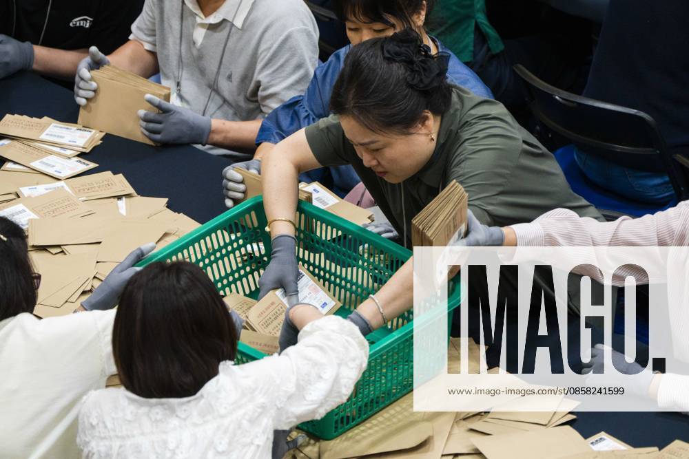 Poll workers sort mail-in ballots after the conclusion of voting in South KoreaÃ¢â‚¬â ¢s local elections on Wednesday, June 3, 2026 in Seoul, South Korea. Seoul South Korea - ZUMAh163 20260603_znp_h163_023