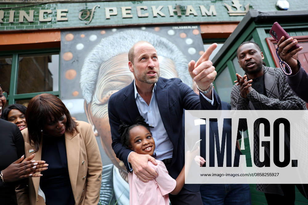 The Prince Of Wales Visits East London LONDON, ENGLAND - JUNE 03: Prince William, Prince of Wales hugs a young child outside The Prince of Peckham pub in Peckham on June 03, 2026 in London, England. The Prince of Wales visited grassroots initiatives encouraging positive social change., Credit:Chris Jackson PA ROTA - B68 Avalon United Kingdom, England, London