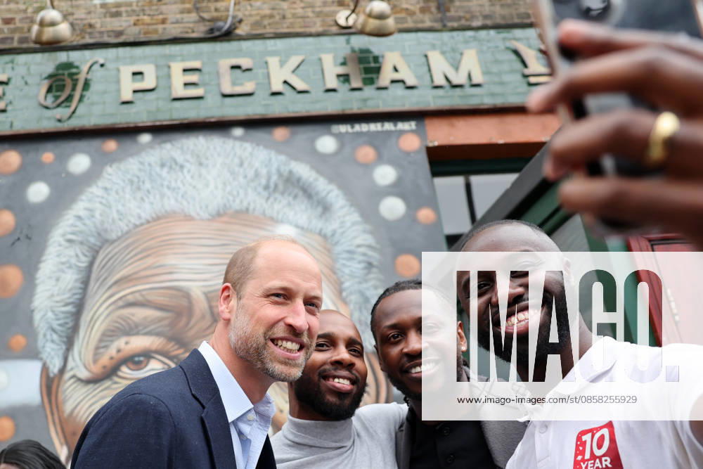 The Prince Of Wales Visits East London LONDON, ENGLAND - JUNE 03: Prince William, Prince of Wales poses for a selfie with local residents during his visit to The Prince of Peckham pub in Peckham on June 03, 2026 in London, England. The Prince of Wales visited grassroots initiatives encouraging positive social change., Credit:Chris Jackson PA ROTA - B68 Avalon United Kingdom, England, London