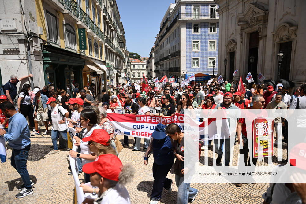 Nationwide Strike For Workers Lisbon LISBON, PORTUGAL - JUNE 03: Protesters hold a banner and wave red trade union flags as they line the streets during a national mobilization in Lisbon, Portugal on June 03, 2026. The demonstration, organized under the National Fight Day motto, demands increased wages, guaranteed labor rights, and measures against the rising cost of living, while advocating for the right to health and housing. Zed Jameson Anadolu Lisbon Portugal. Editorial use only. Please get in touch for any other usage.