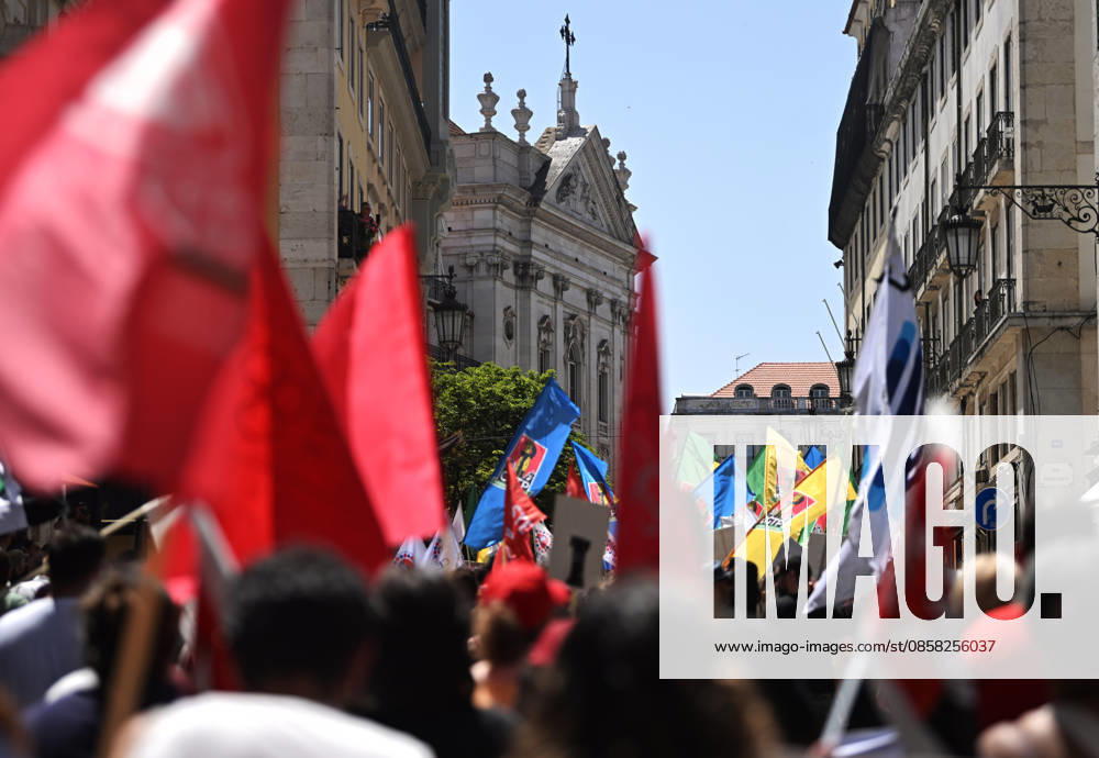 Nationwide Strike For Workers Lisbon LISBON, PORTUGAL - JUNE 03: Protesters hold a banner and wave red trade union flags as they line the streets during a national mobilization in Lisbon, Portugal on June 03, 2026. The demonstration, organized under the National Fight Day motto, demands increased wages, guaranteed labor rights, and measures against the rising cost of living, while advocating for the right to health and housing. Zed Jameson Anadolu Lisbon Portugal. Editorial use only. Please get in touch for any other usage.