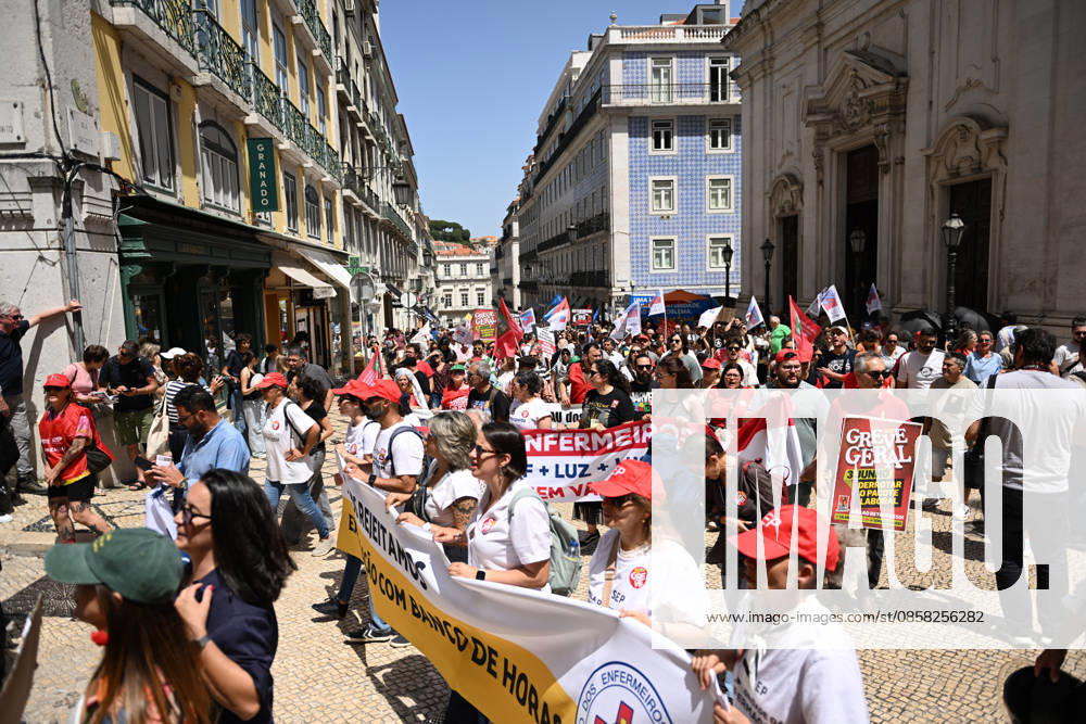 Nationwide Strike For Workers Lisbon LISBON, PORTUGAL - JUNE 03: Protesters hold a banner and wave red trade union flags as they line the streets during a national mobilization in Lisbon, Portugal on June 03, 2026. The demonstration, organized under the National Fight Day motto, demands increased wages, guaranteed labor rights, and measures against the rising cost of living, while advocating for the right to health and housing. Zed Jameson Anadolu Lisbon Portugal. Editorial use only. Please get in touch for any other usage.