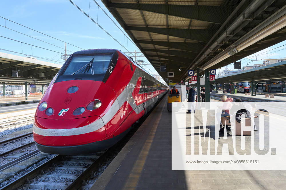 Trenitalia Trains At Bari Centrale Station A Trenitalia Frecciarossa 1000 high-speed train stands at a platform of Bari Centrale station as passengers wait and railway workers operate on the platform, on March 9, 2026, in Bari, Italy. Bari Italy