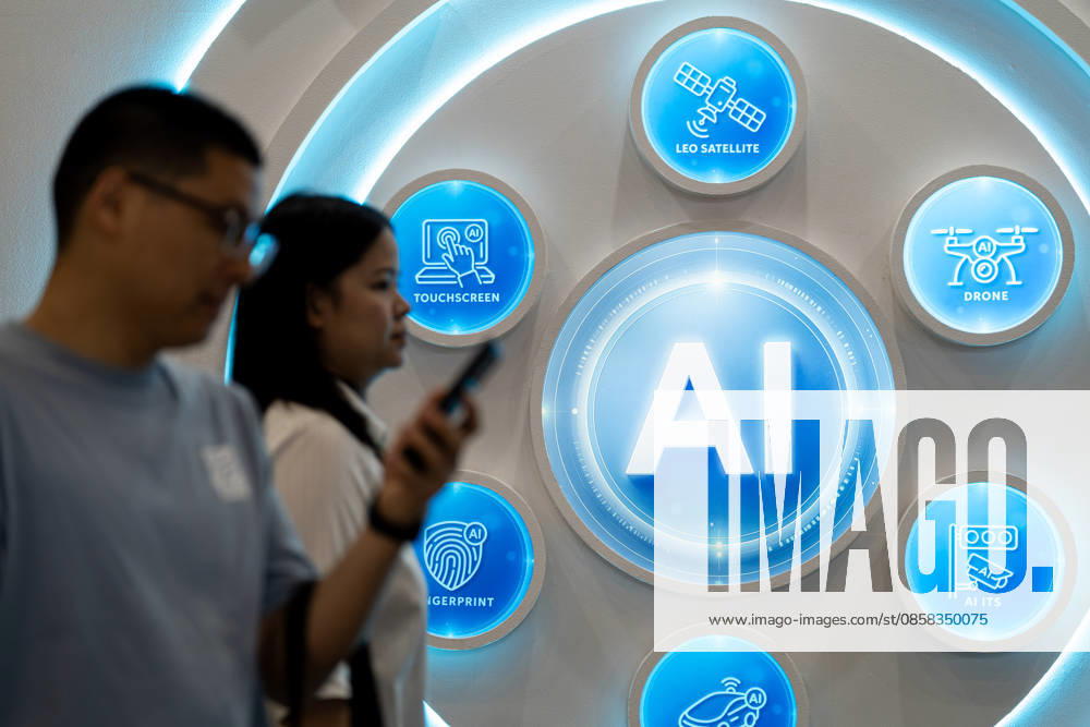 TAIWAN-COMPUTEX People walks pass an AI Logo at Computex 2026 in Taipei, Taiwan, June 4, 2026. NEXPHER Vernon Yuen TAIPEI