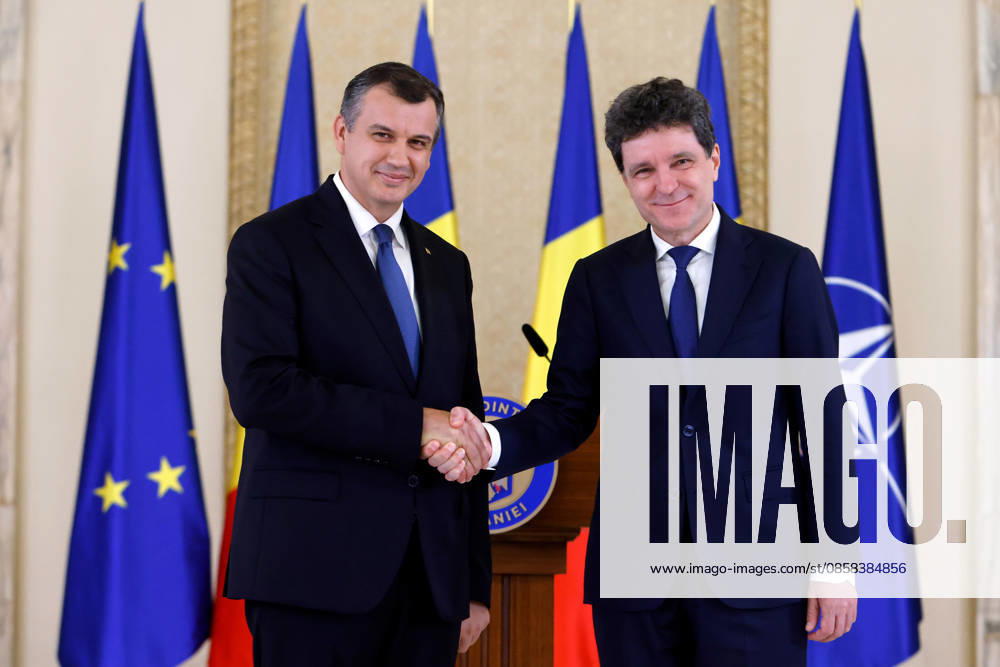 (260604) -- BUCHAREST, June 4, 2026 -- Romania s prime minister-designate Eugen Tomac (L) shakes hands with Romanian President Nicusor Dan at Cotroceni palace in Bucharest, Romania, on June 4, 2026. Romanian President Nicusor Dan on Thursday nominated his adviser Eugen Tomac as prime minister-designate. (Photo by Xinhua) ROMANIA-BUCHAREST-PM-DESIGNATE CristianxCristel