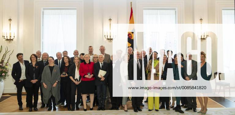 Federal President Frank Walter Steinmeier 11R and his wife Buedenbender 13R pose for a group photo with the recipient of the Cross of Merit of the Order of Merit of the Federal Republic of Germany at Bellevue Palace in Berlin on 2 October 2018 Award of Merit in Berlin