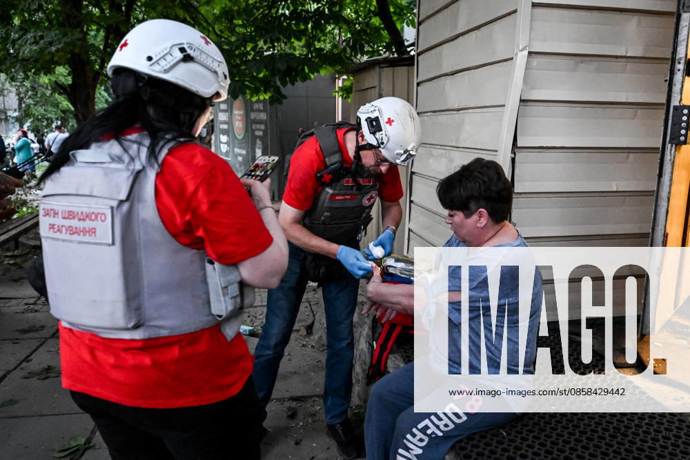 A medic administers first aid to an injured woman during a response effort to a Russian drone strike on the Shevchenkivskyi district of Zaporizhzhia, Ukraine, June 4, 2026. Russian forces launched a drone strike on one of the city’s residential areas, killing one person and injuring 16 others. The blast wave and debris shattered windows and balconies in apartment blocks. (Photo by Dmytro Smolienko Ukrinform) Russian forces launch drone strike on district in Zaporizhzhia