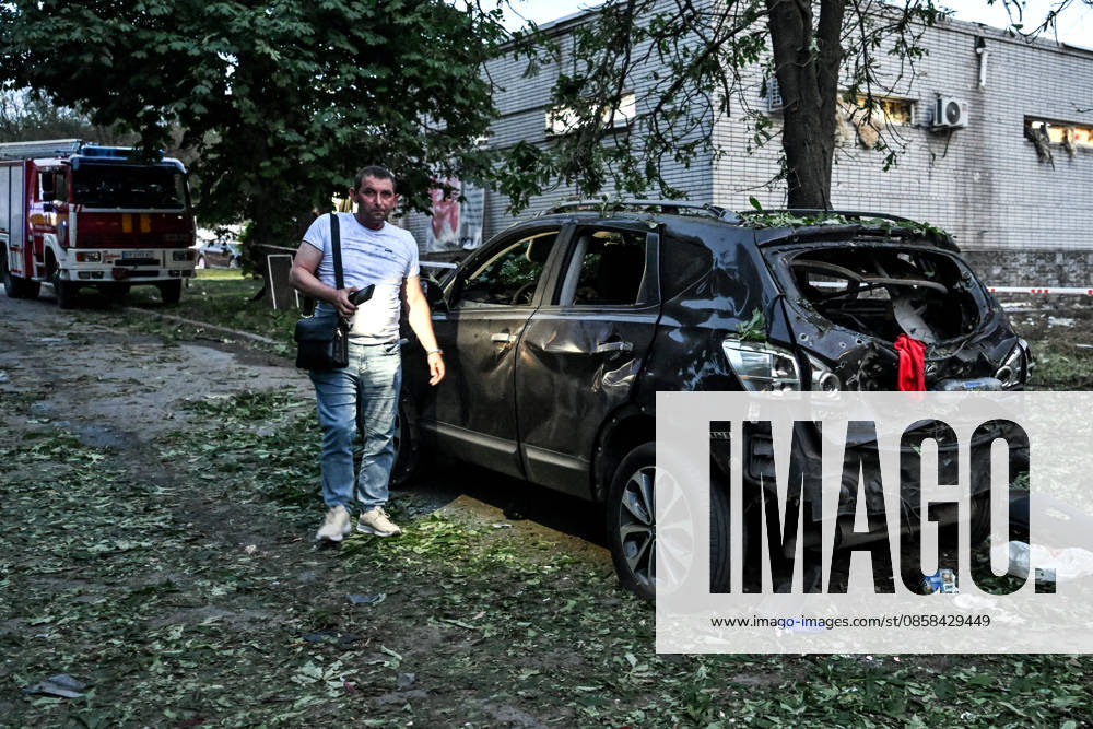 A man stands by a car, damaged by a Russian drone strike on the Shevchenkivskyi district of Zaporizhzhia, Ukraine, June 4, 2026. Russian forces launched a drone strike on one of the city’s residential areas, killing one person and injuring 16 others. The blast wave and debris shattered windows and balconies in apartment blocks. (Photo by Dmytro Smolienko Ukrinform) Russian forces launch drone strike on district in Zaporizhzhia