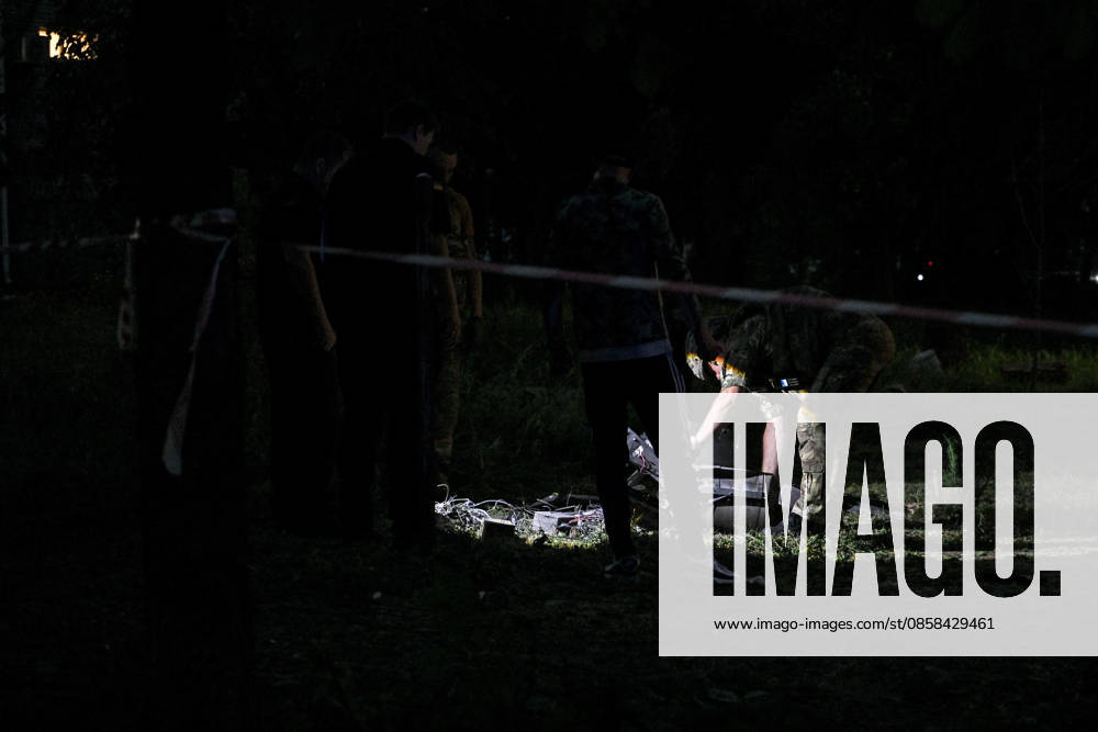 A law enforcer examines Russian drone debris that touched down in a residential area in the Shevchenkivskyi district of Zaporizhzhia, Ukraine, June 4, 2026. Russian forces launched a drone strike on one of the city’s residential areas, killing one person and injuring 16 others. The blast wave and debris shattered windows and balconies in apartment blocks. (Photo by Dmytro Smolienko Ukrinform) Russian forces launch drone strike on district in Zaporizhzhia