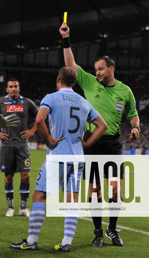 Pablo Zabaleta of Manchester City receives a yellow card UEFA Champions League Group A Manchester City v Napoli 14th September, 2011 .