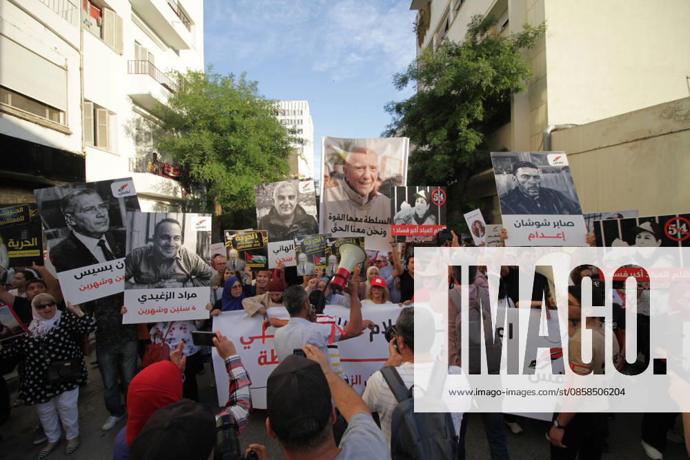 Demonstrators march through central Tunis during a protest demanding freedom of expression, independent public media, and an end to legal measures they say criminalize free speech, on June 5, 2026. The rally was organized in opposition to Decree-Law 54 and reflects growing concerns among civil society groups over restrictions on media freedoms and political dissent in Tunisia. Tunis Tunisia - ZUMAm342 20260605_zsp_m342_019