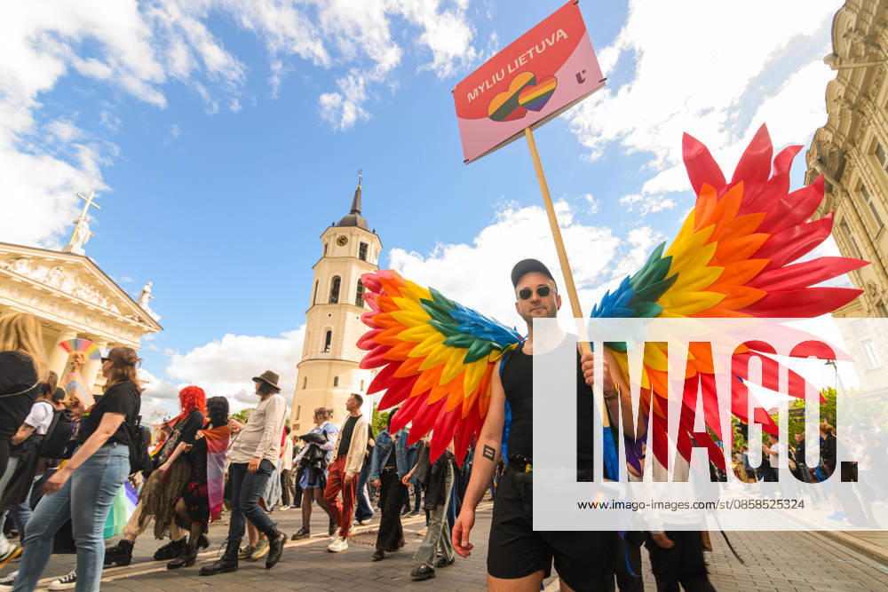 A participant wearing rainbow wings holds a placard saying Myliu Lietuv? (I love Lithuania) during the pride parade. Vilnius on June 6 marked Lithuanian Pride 2026 with a march for equality, drawing thousands to the city center in a public show of visibility, solidarity, and support for LGBTQ+ rights. Vilnius Lithuania - ZUMAs197 20260606_aaa_s197_201