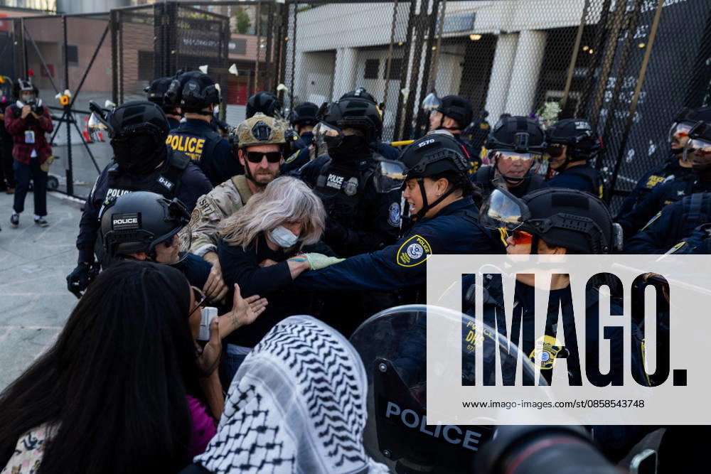 LOS ANGELES, CA - JUNE 06: A protester is arrested by police officers outside a federal detention center during an anti-ICE protest on June 6, 2026 in Los Angeles, California.