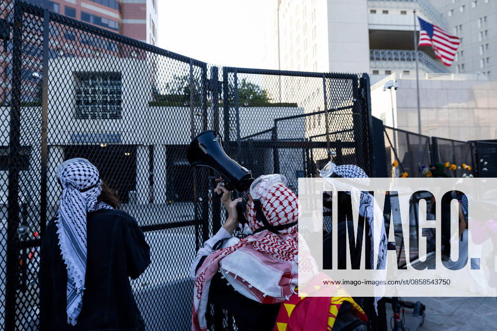 LOS ANGELES, CA - JUNE 06: Protesters rally outside a federal detention center during an anti-ICE protest on June 6, 2026 in Los Angeles, California.