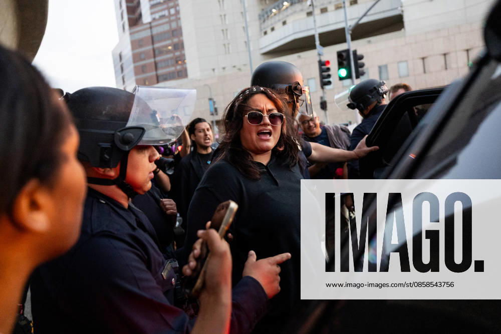 LOS ANGELES, CA - JUNE 06: A protester is arrested by police officers outside a federal detention center during an anti-ICE protest on June 6, 2026 in Los Angeles, California.