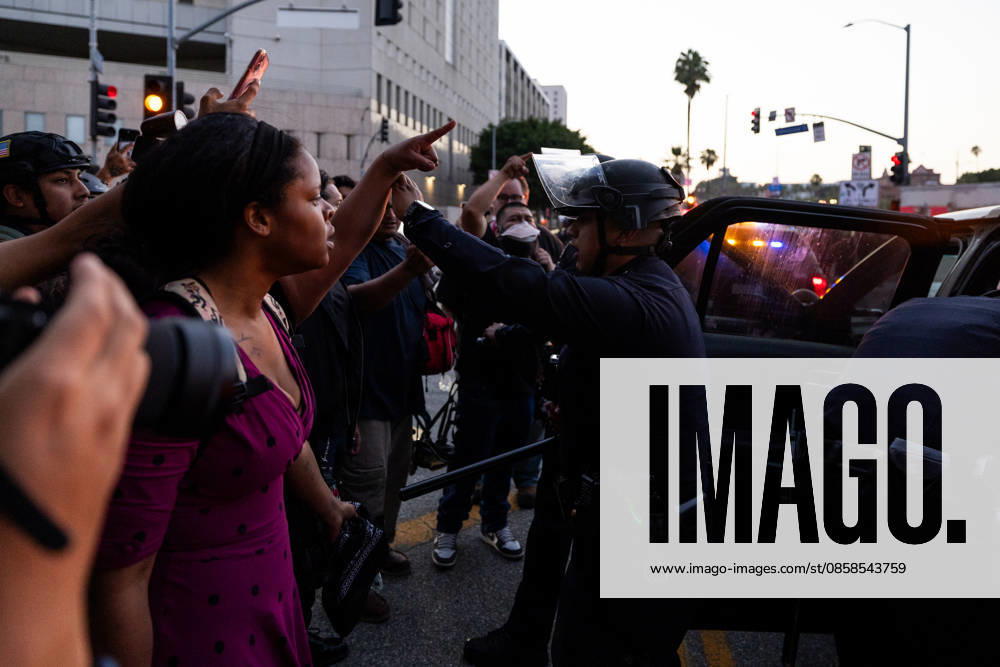 LOS ANGELES, CA - JUNE 06: Anti-ICE demonstrators clash with police officers outside a federal detention center on June 6, 2026 in Los Angeles, California.