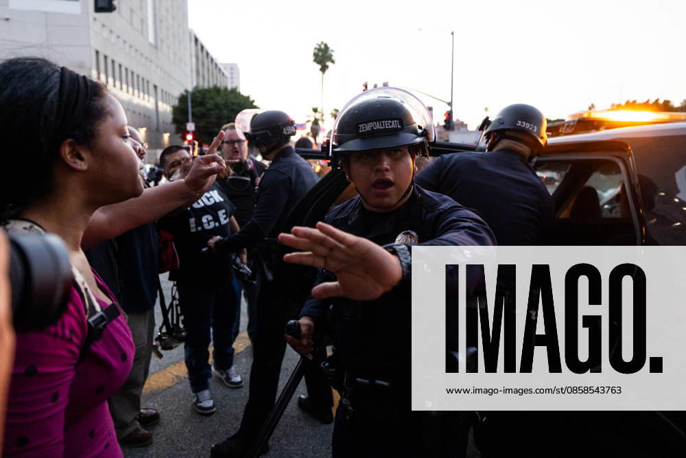LOS ANGELES, CA - JUNE 06: Anti-ICE demonstrators clash with police officers outside a federal detention center on June 6, 2026 in Los Angeles, California.