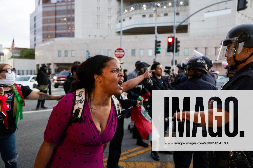 LOS ANGELES, CA - JUNE 06: Anti-ICE demonstrators clash with police officers outside a federal detention center on June 6, 2026 in Los Angeles, California.