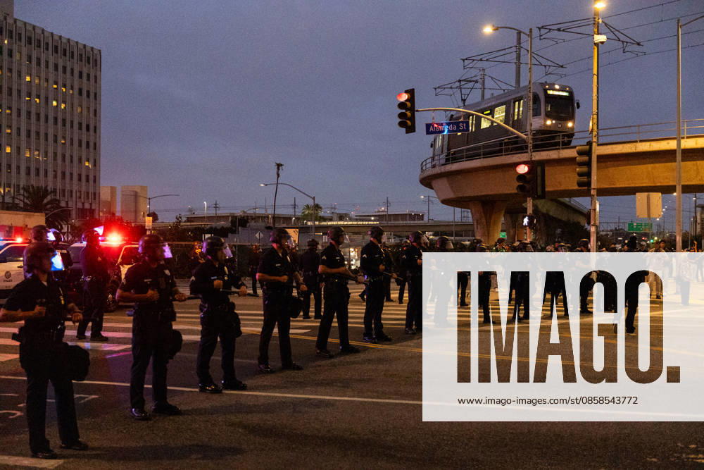 LOS ANGELES, CA - JUNE 06: Police officers stand guard outside a federal detention center during an anti-ICE protest on June 6, 2026 in Los Angeles, California.