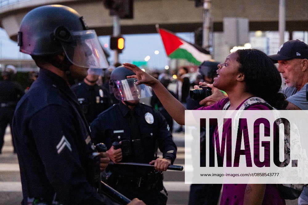 LOS ANGELES, CA - JUNE 06: Anti-ICE demonstrators clash with police officers outside a federal detention center on June 6, 2026 in Los Angeles, California.