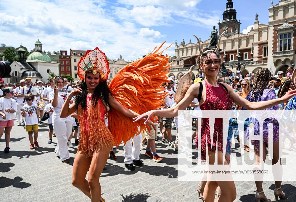 Poland s 25th Dragon Parade in Krakow KRAKOW, POLAND - JUNE 07: People take part the Dragon Parade during the 25th Great Dragon Parade edition at the Main Square, Krakow, Poland, on June 07, 2026. For the 25th year in a row, Krakow brings the annual celebration representing the myth of Dragon, the city symbol. Omar Marques Anadolu Krakow Poland. Editorial use only. Please get in touch for any other usage.